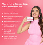 Woman holding alite soap bar with product details 