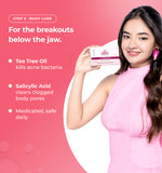 Woman holding a skincare product with text about tea tree oil 
