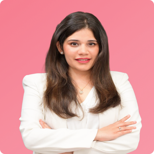 Woman in a white outfit with arms crossed 