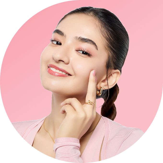 Woman with a finger on her cheek 