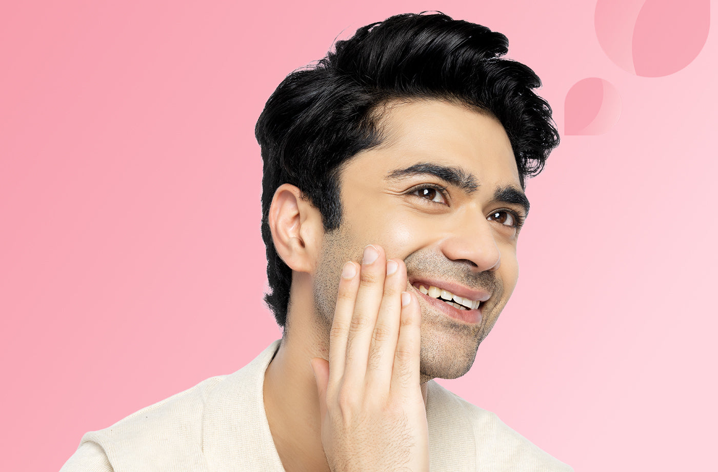 Man applying cream to his face 