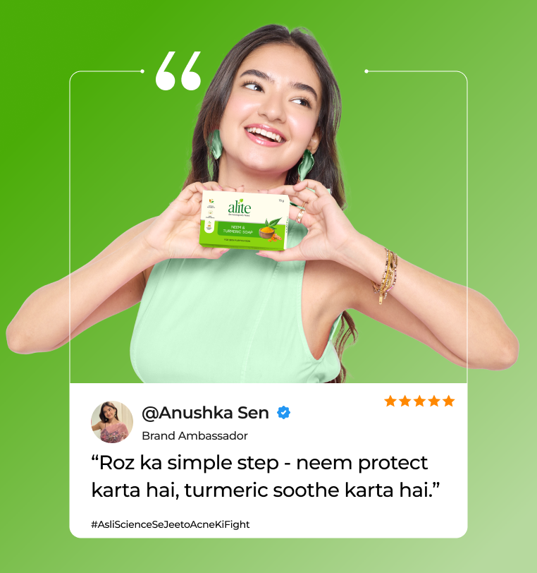 Woman holding a alite neem and turmeric soap  