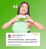 Woman holding a skincare product with text and branding 